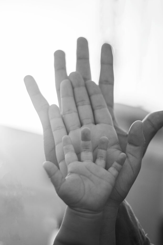 Photo by Melvin Matute: https://www.pexels.com/photo/close-up-of-parents-and-child-palms-together-6211446/